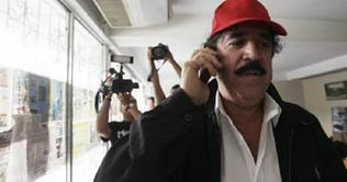 Honduran coup leaders, Zelaya agree to talk next week